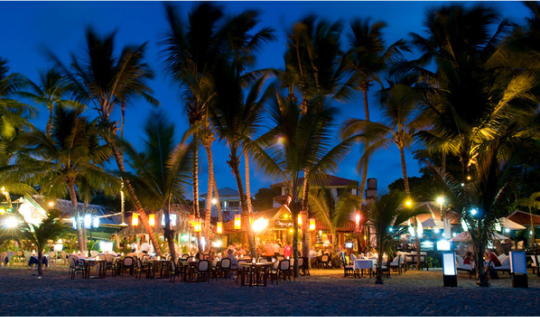 A Dominican beach party at night