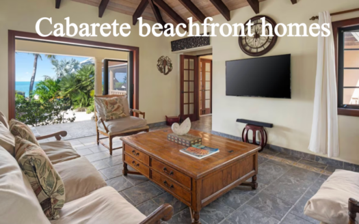 Beachfront condos and palm trees along the shoreline at Kite Beach in Cabarete, Dominican Republic