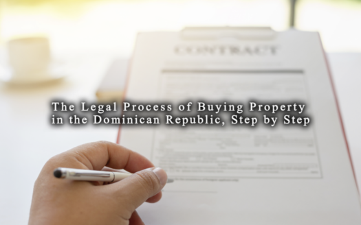Attorney and foreign buyer reviewing Dominican Republic property closing documents at a desk